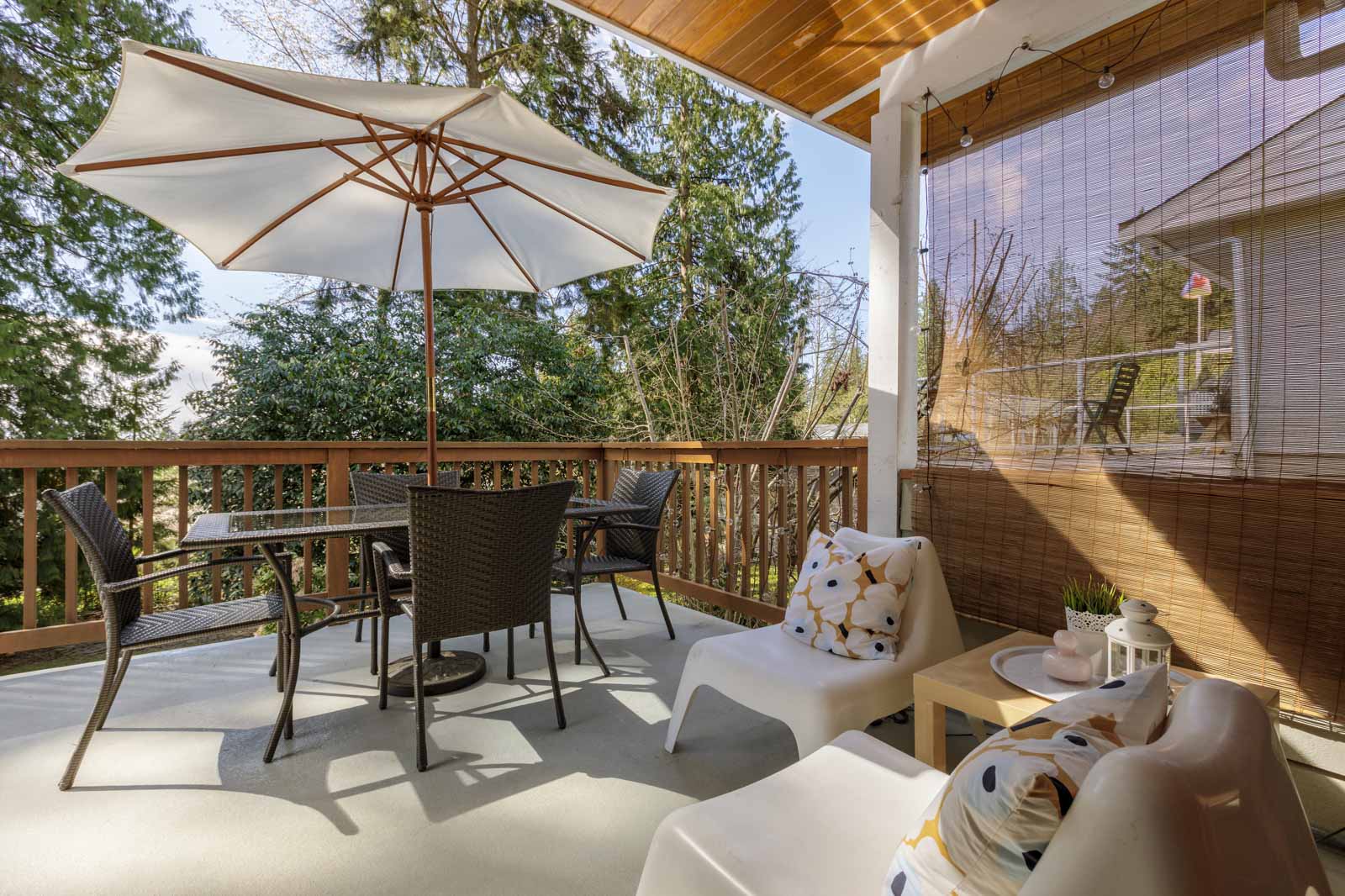 back covered deck area with sunlight