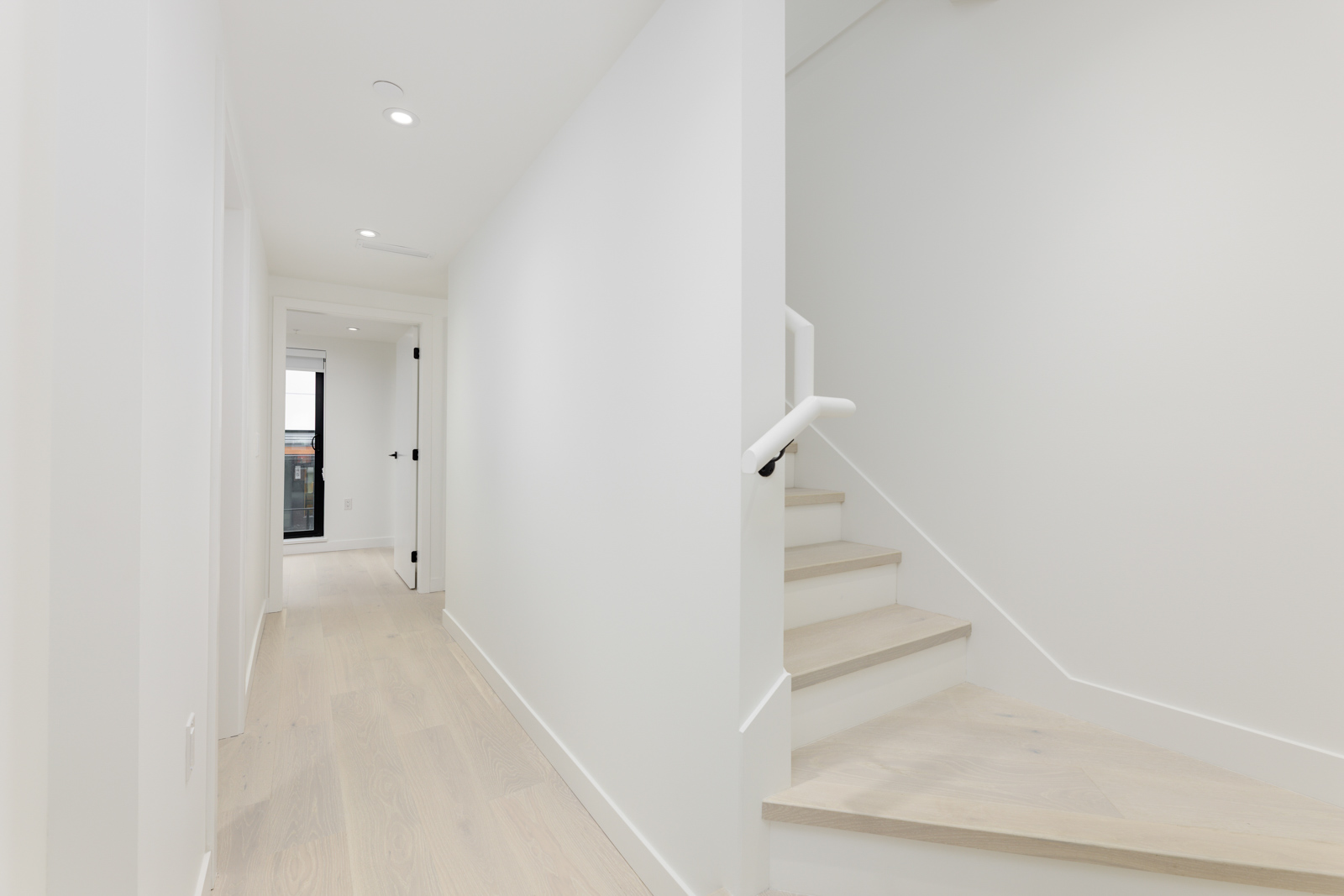Interior hallway and staircase of a Vancouver townhouse rental property managed by Birds Nest Properties